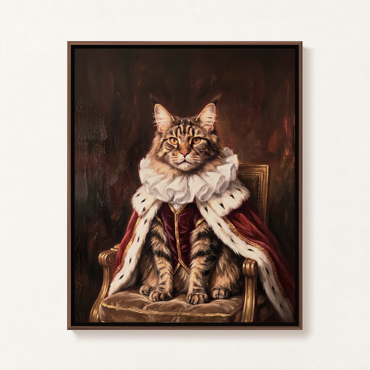 Royal Sitter oil portrait of a tabby cat in an ermine-trimmed red royal cape, walnut frame on a white wall