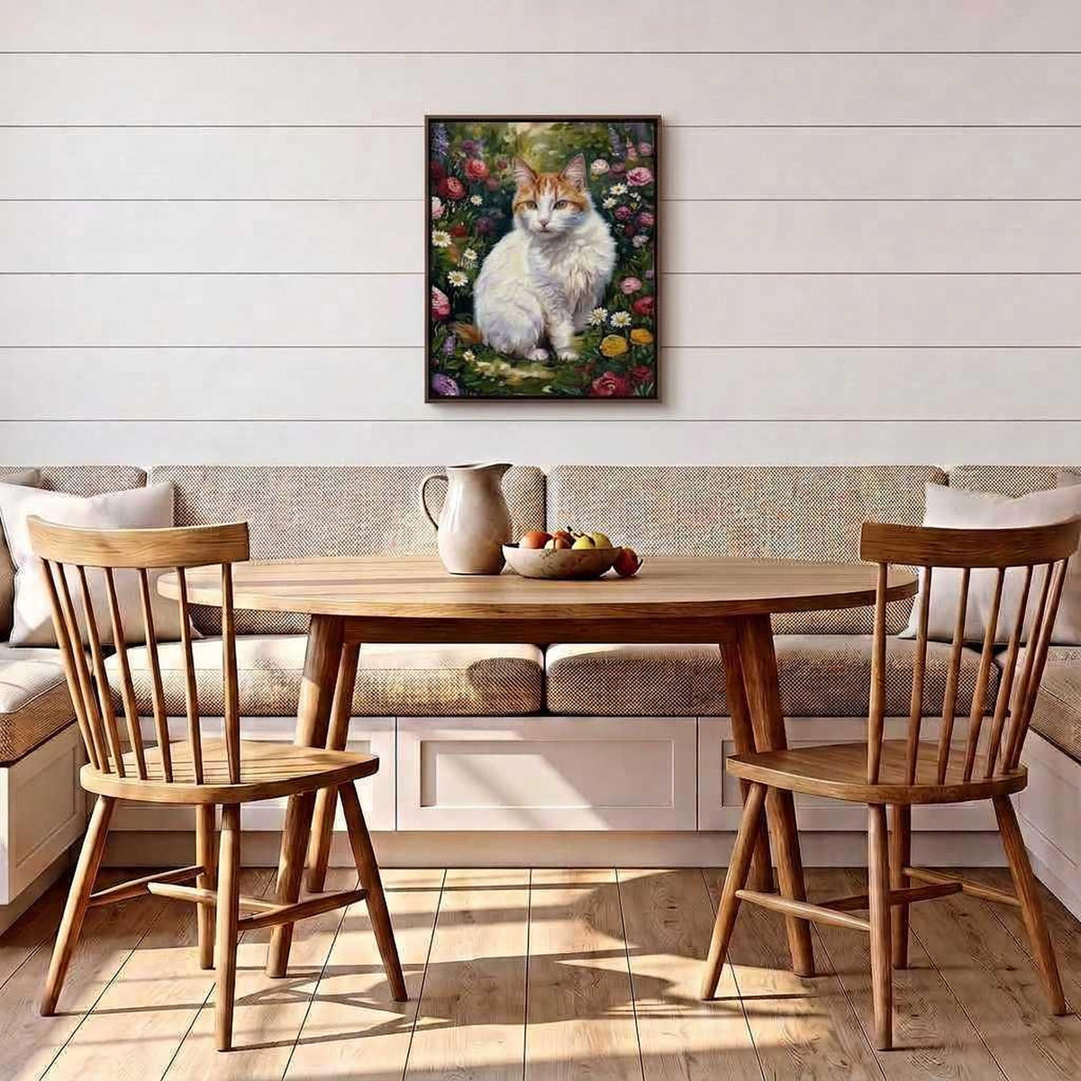 Meadow Bloom cat portrait hanging on a white shiplap wall above a breakfast nook